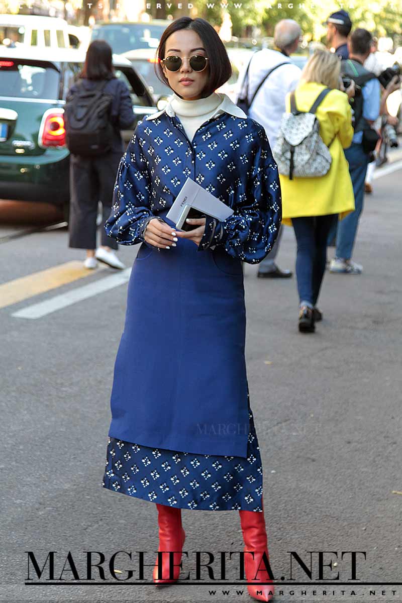 Street style inverno 2017 2018. Tendenza moda: abiti lunghi con fantasia