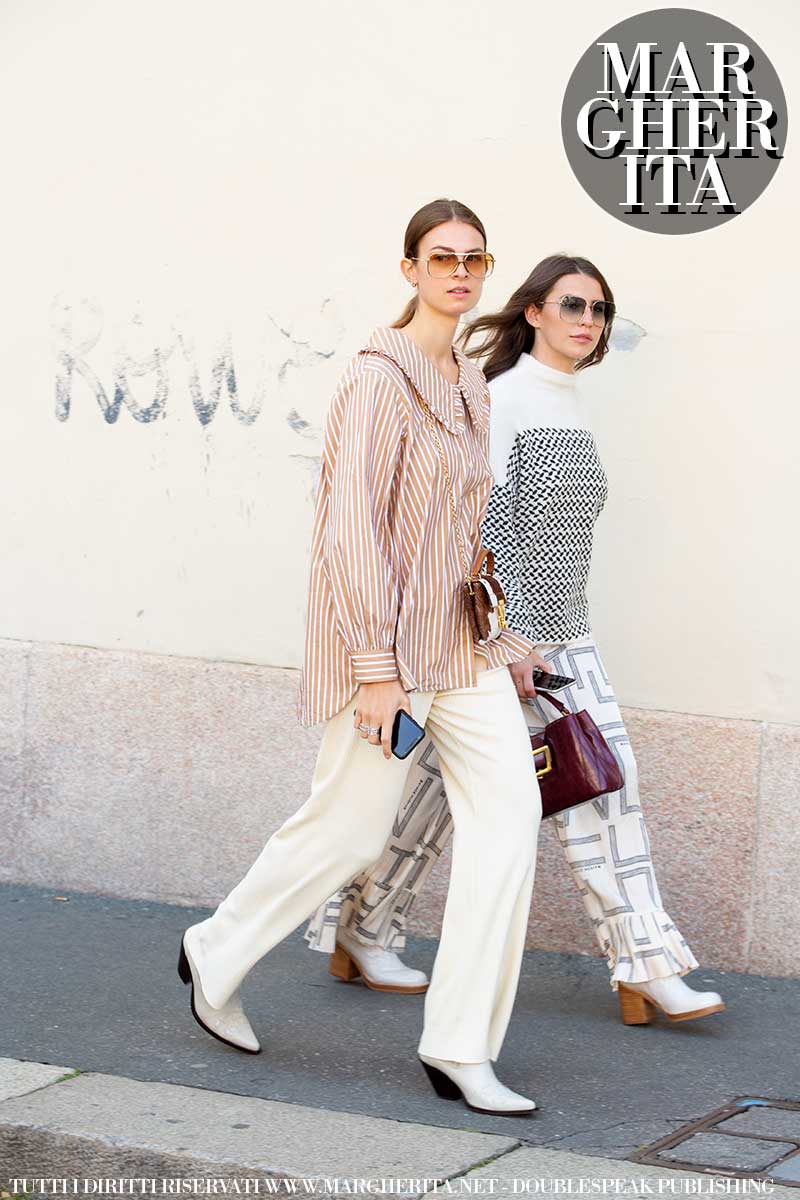 Moda street style donna estate 2021. Pantaloni bianchi